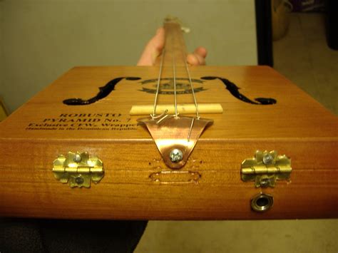 build an electric cigar box guitar|homemade cigar box guitar.